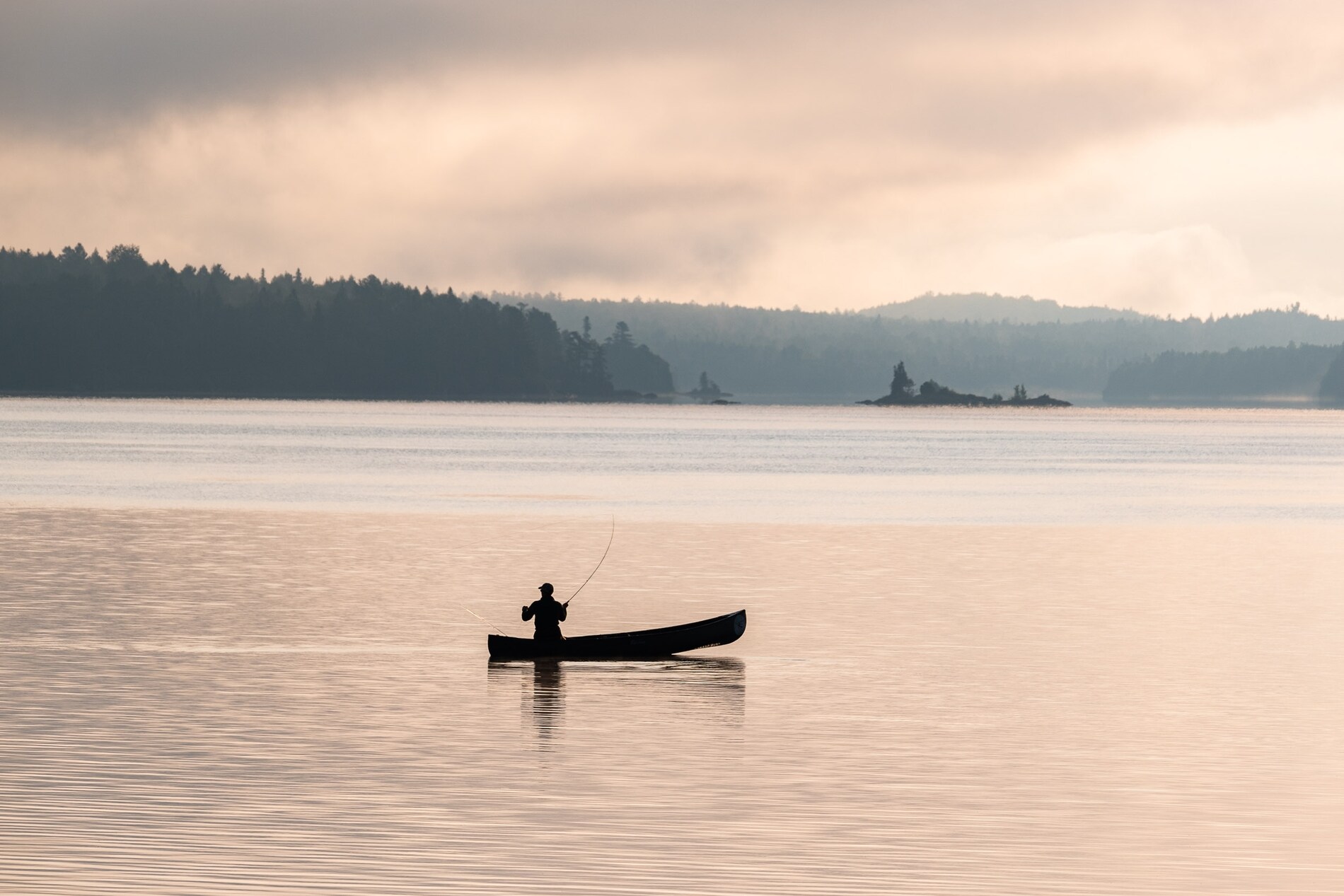 Person fishing on the Allagash Wilderness Waterway