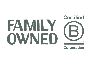 Allagash Bungalow sign displayed in the front window saying family owner and the b corp logo