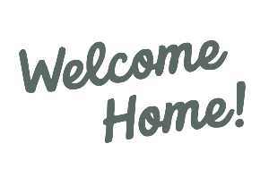Allagash Bungalow sign displayed in the front window saying welcome home