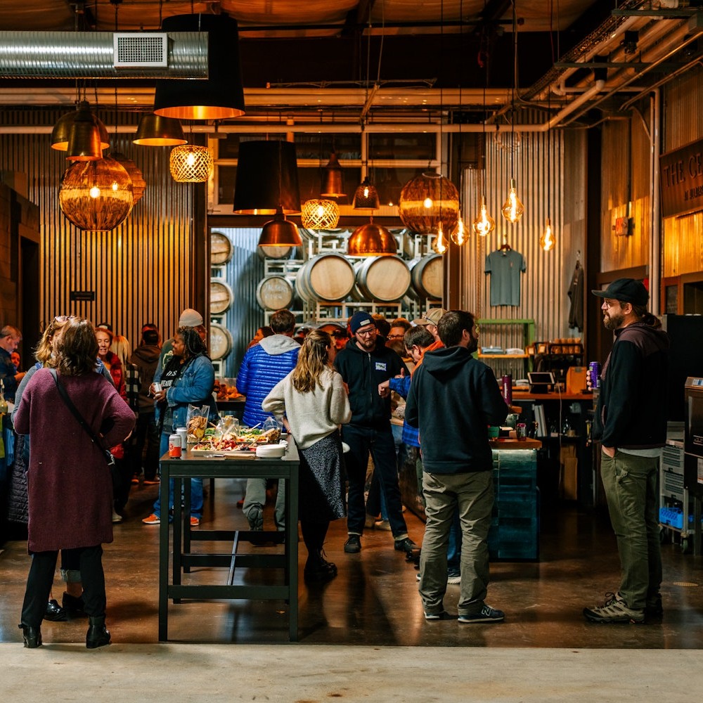 Folks at Allagash Brewing Company enjoying a little event at the Allagash Cellars