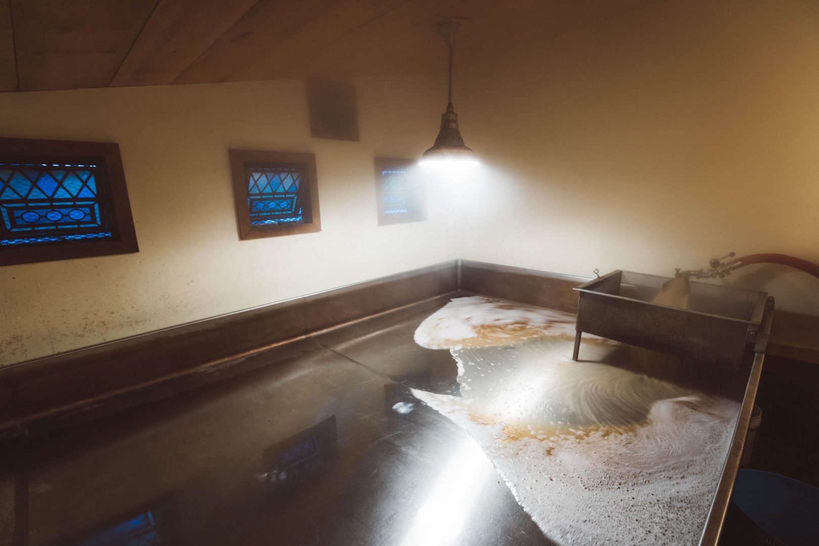 Wort heads into the coolship at Allagash Brewing Company.