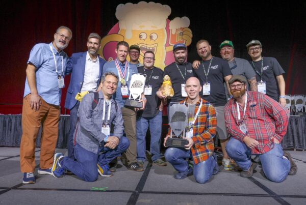 The Allagash team celebrating a gold medal for Allagash Tripel, a gold medal for Allagash Lager, and brewery of the year (in our size category) at the Great American Beer Festival 2025