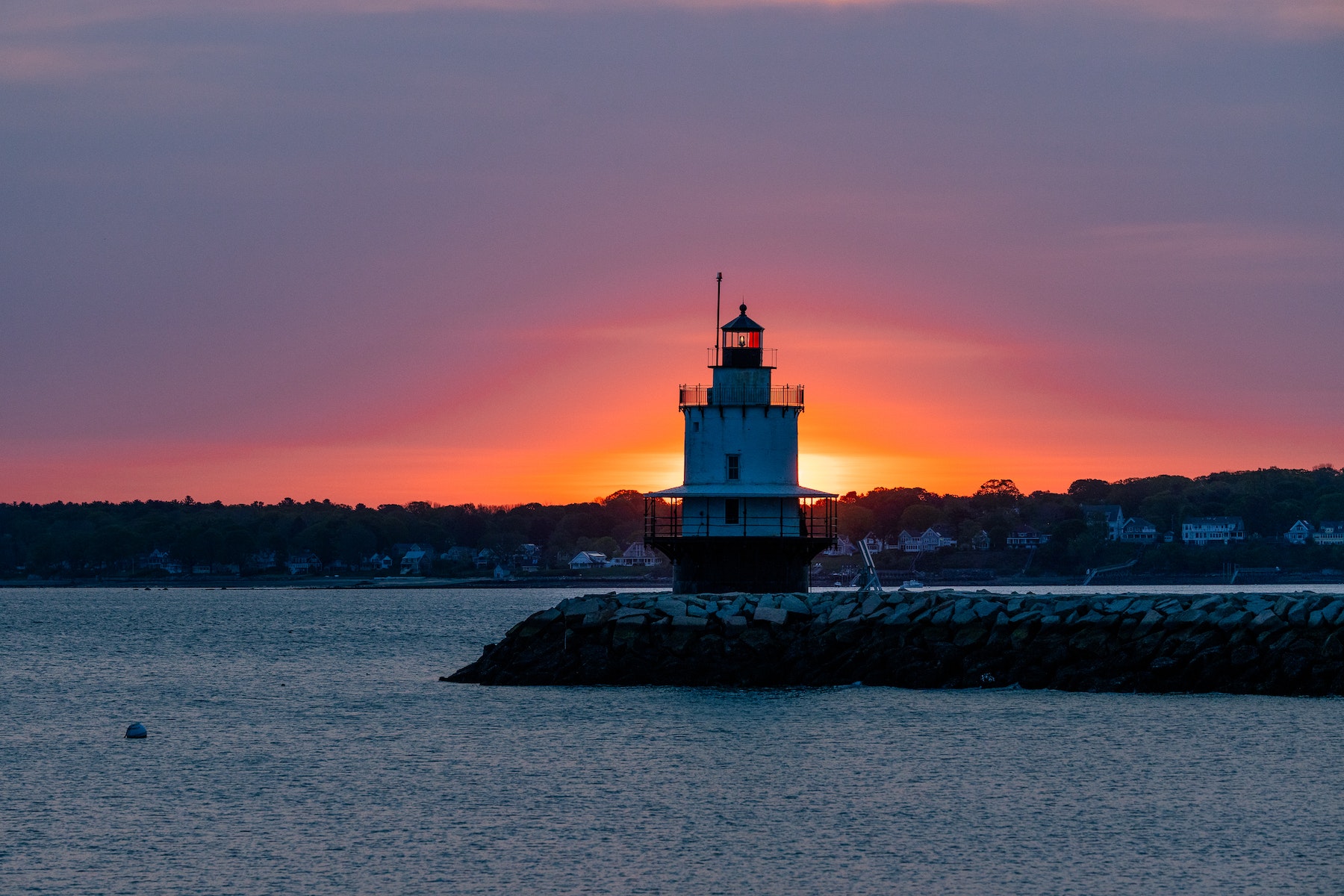 Sunset view of Portland Ledge Lighthouse in South Portland, Maine.