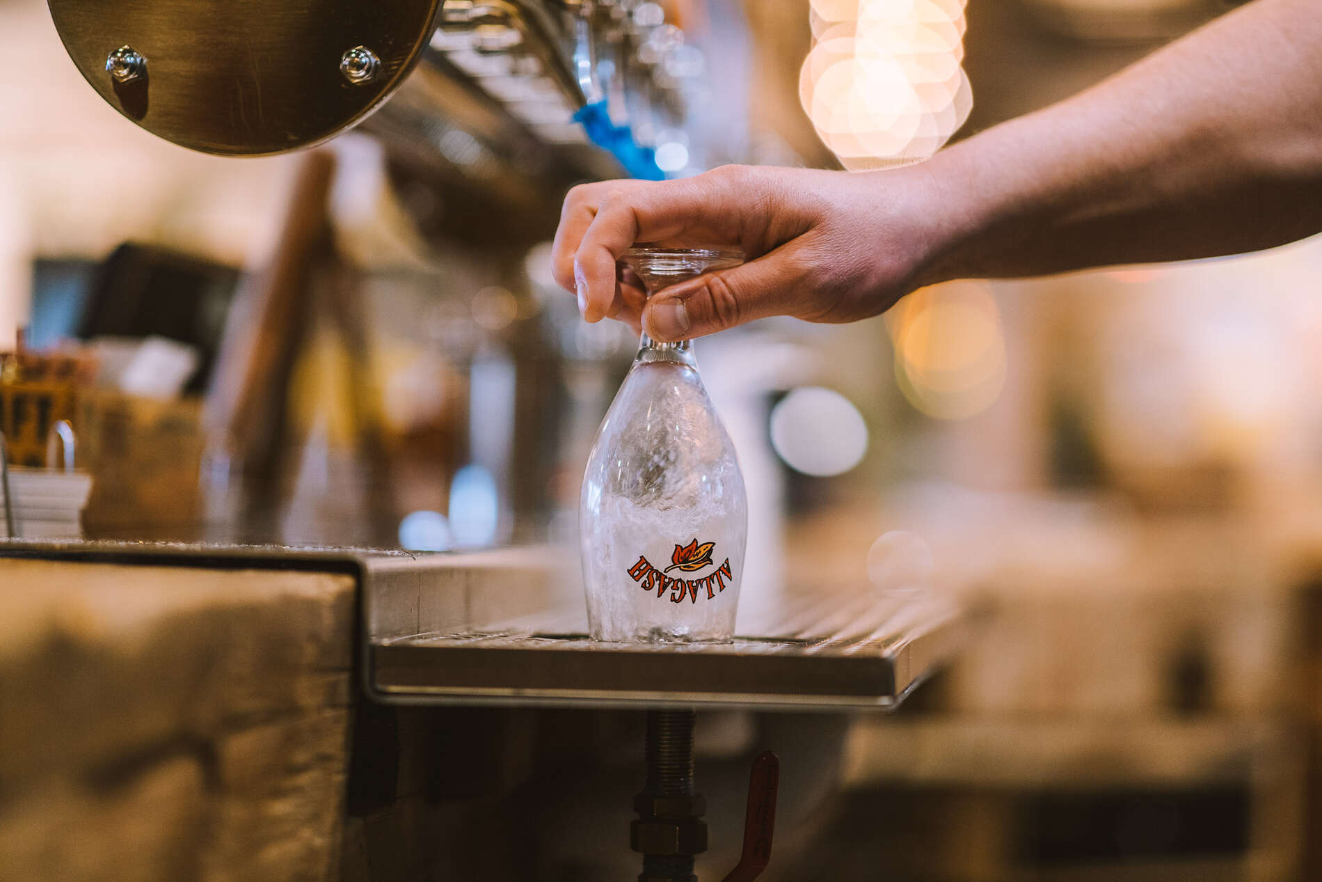 Why rinse a glass before pouring beer into it?