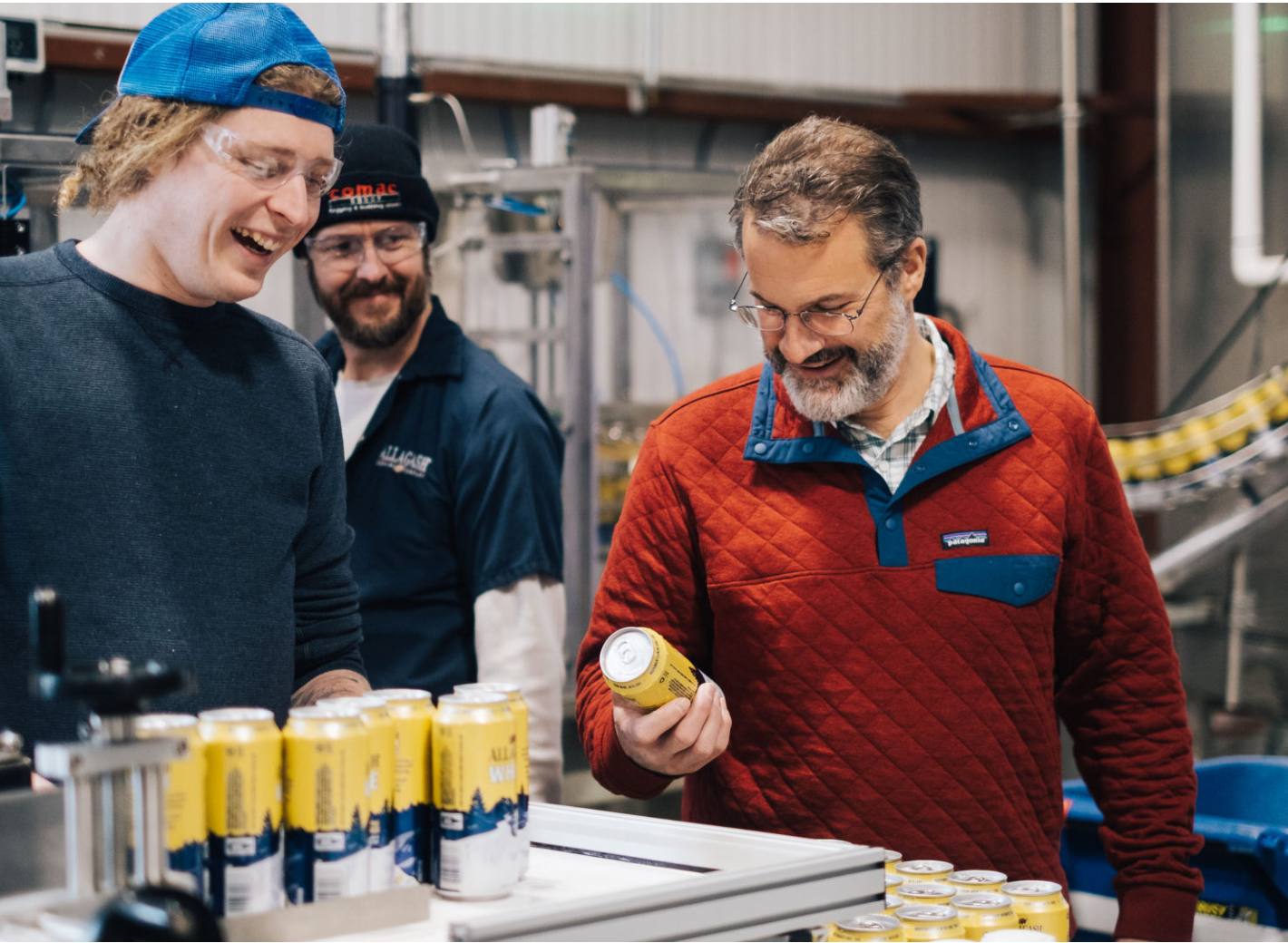 rob tod looking at the first Allagash White cans