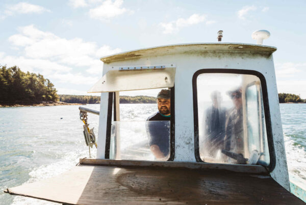 Out on an oyster boat out on the river to harvest some oysters